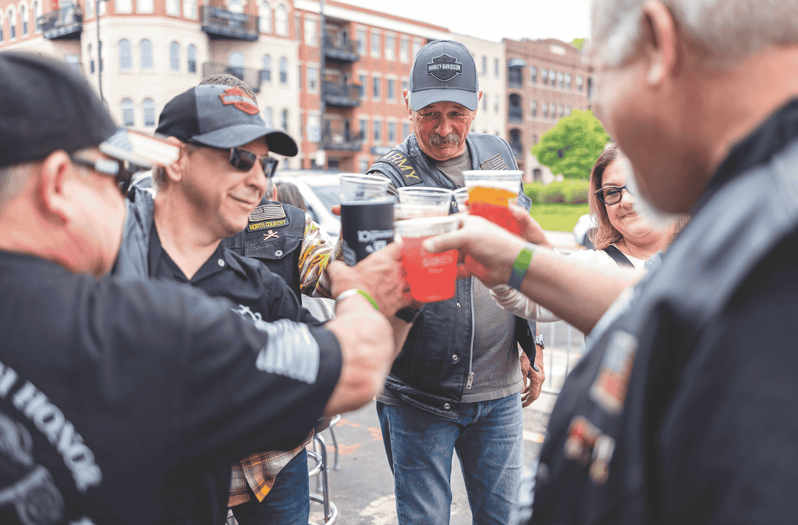 The police officers are drinking soft drinks.