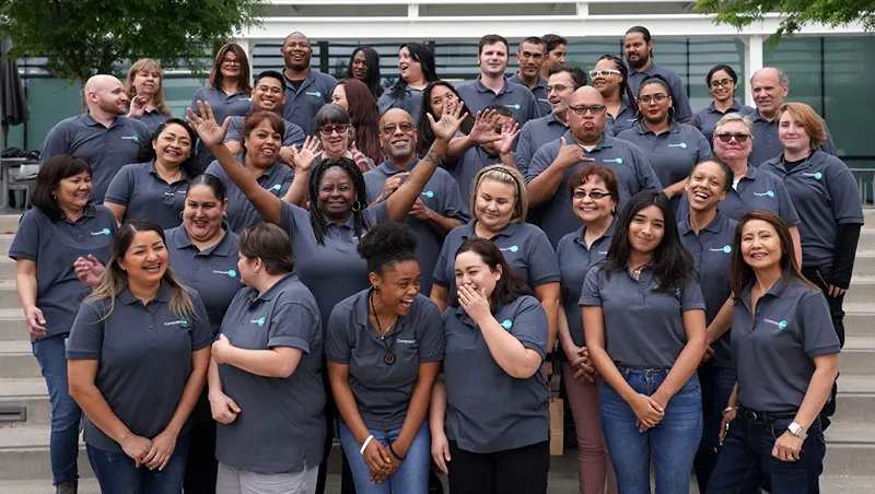 A group staff is wearing a uniform