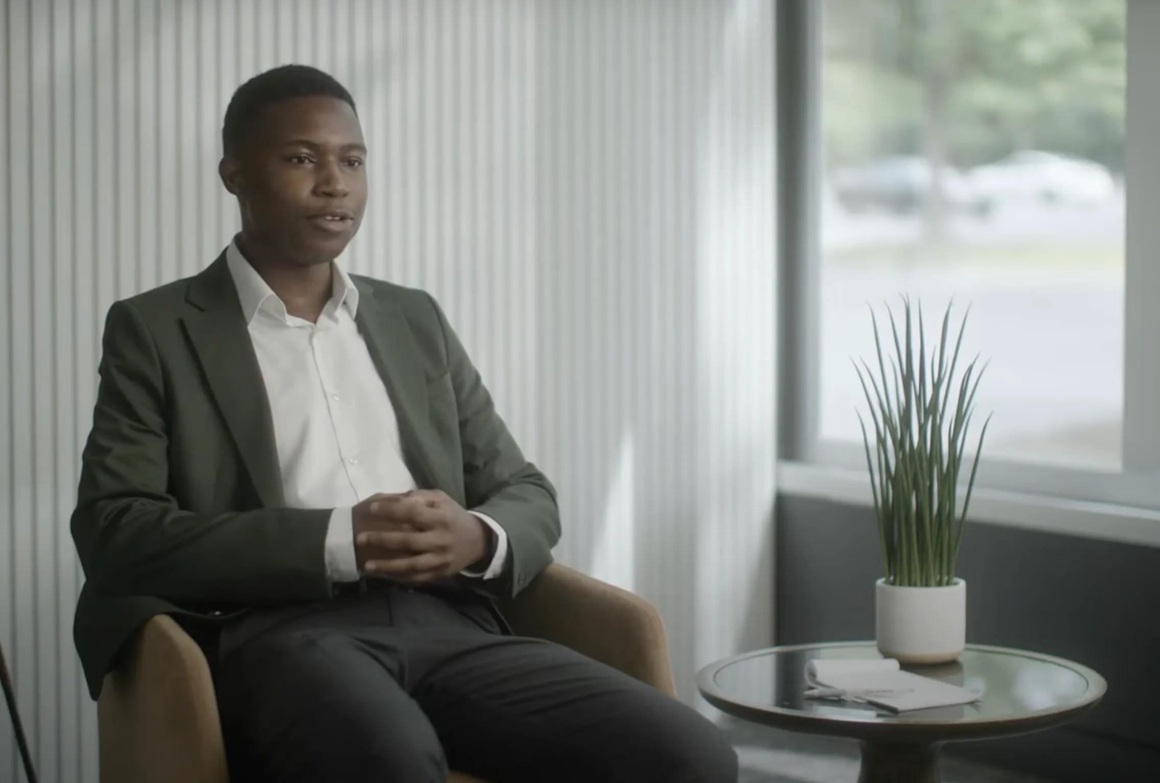 1 male businessman is being interviewed