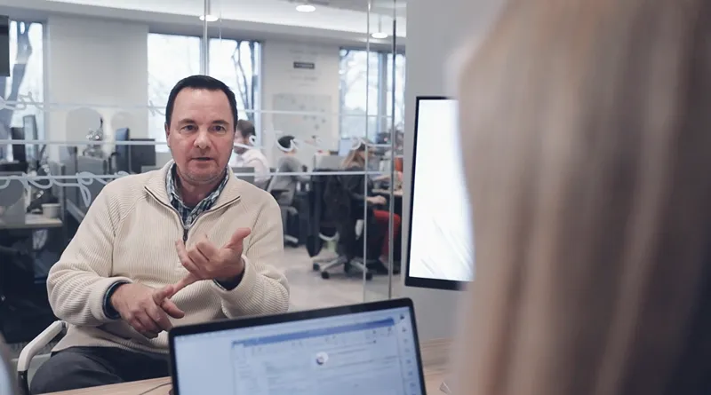 a man talking to a sales person