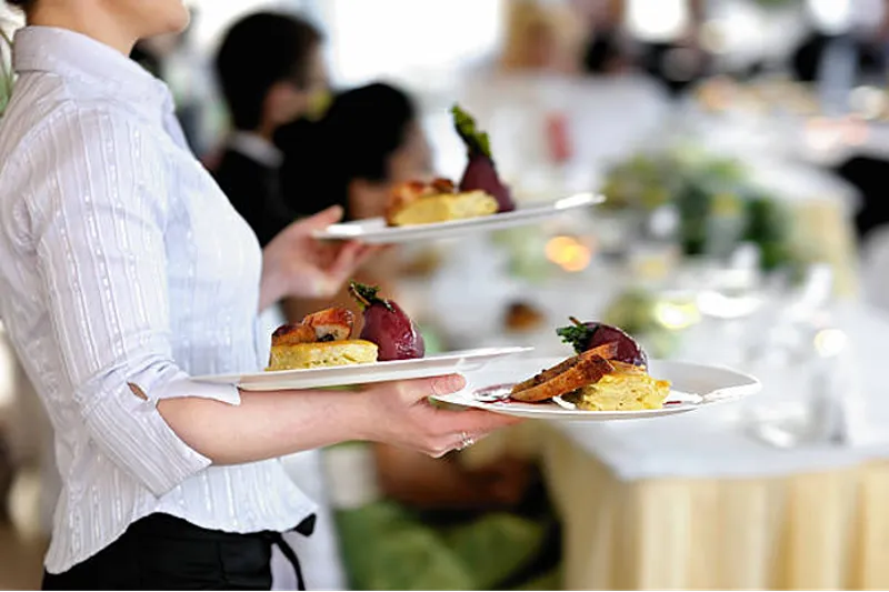 waitress serving food
